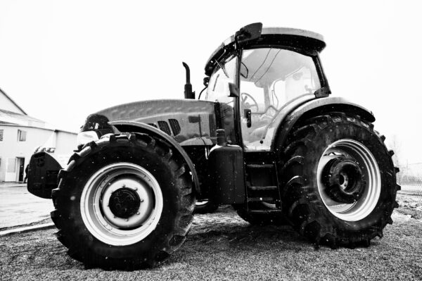 Black and white photo of tractor in snowy weather RPL Certification FAQs- Noble Training
