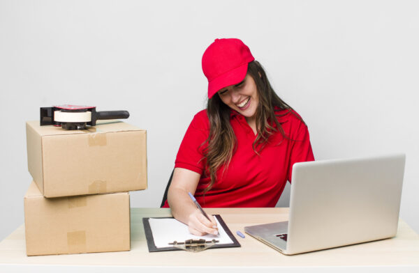 young adult pretty woman. company employee with boxes