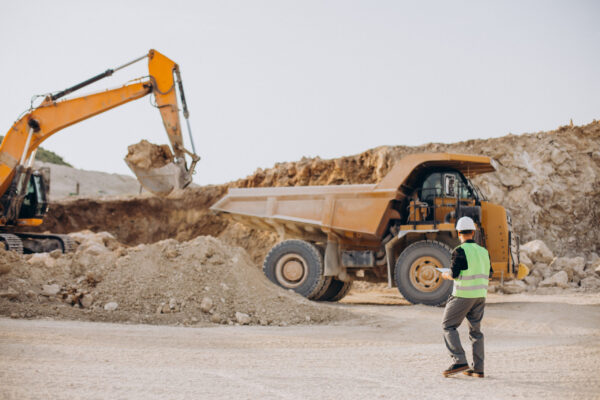 Male worker with bulldozer in sand quarry trade skill certification- Noble training group